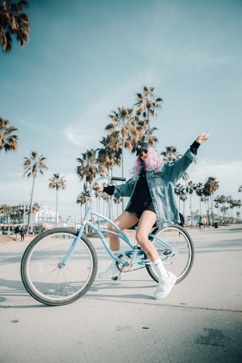 Photo by Bobby Woman rides her bike on a sunny day.